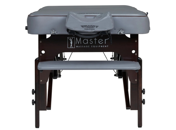 Portable massage table with memory foam cushion.