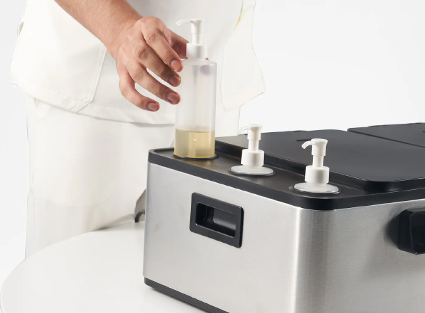 Versatile massage heater for oils, stones, and steam