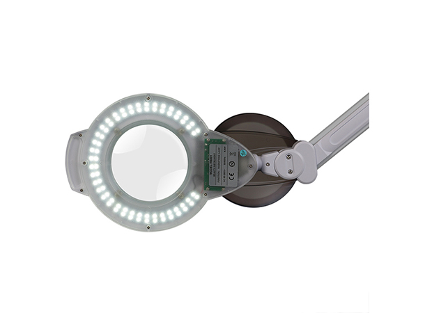 Close-up of Doyen LED magnifying lamp optical glass lens and light ring