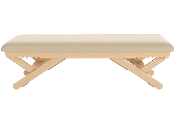 Vibroacoustic massage table with fixed wooden base