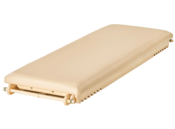 Wooden vibroacoustic massage table for wellness centers