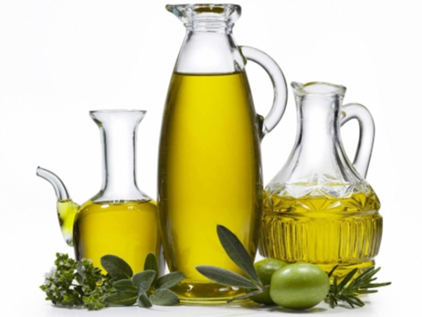 Assorted massage oils with herbs and natural elements