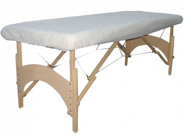 Spa bed with disposable nonwoven fitted sheet