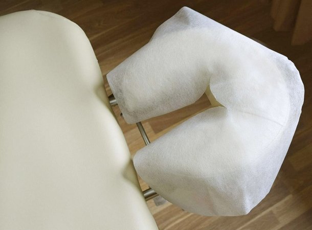 Single-use massage headrest cover