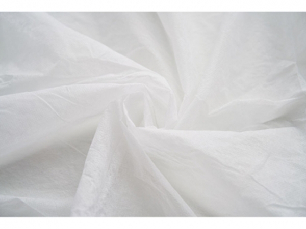 Close-up of nonwoven fabric on massage bed